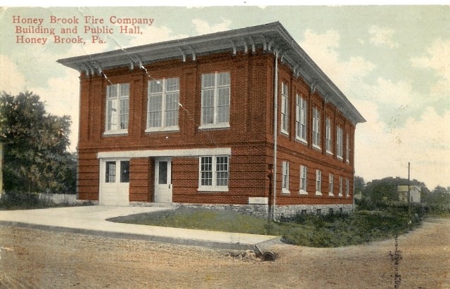 A circa 1913 post card with the fire hall on the front