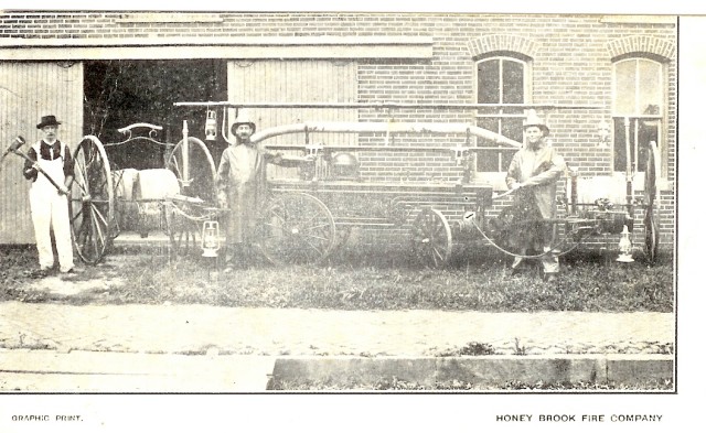 A early 1900's post card with the hand pumper and hose carts. Chief Nelms is in the center.