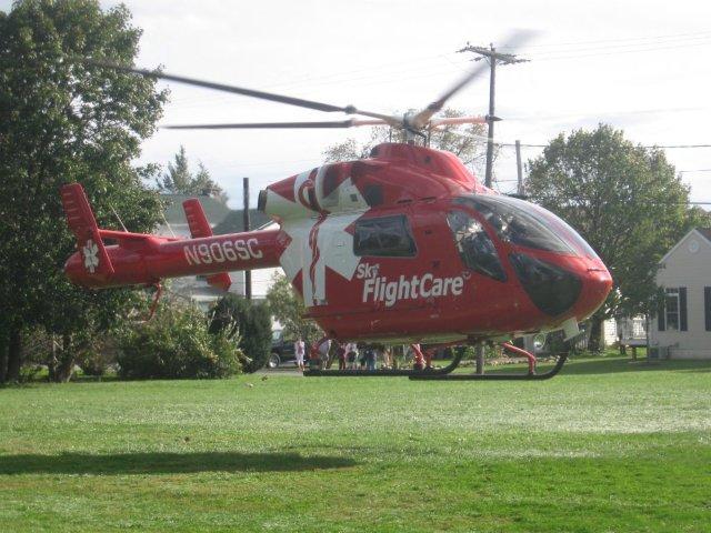 Skycare landing at the Fie Company's Open House.